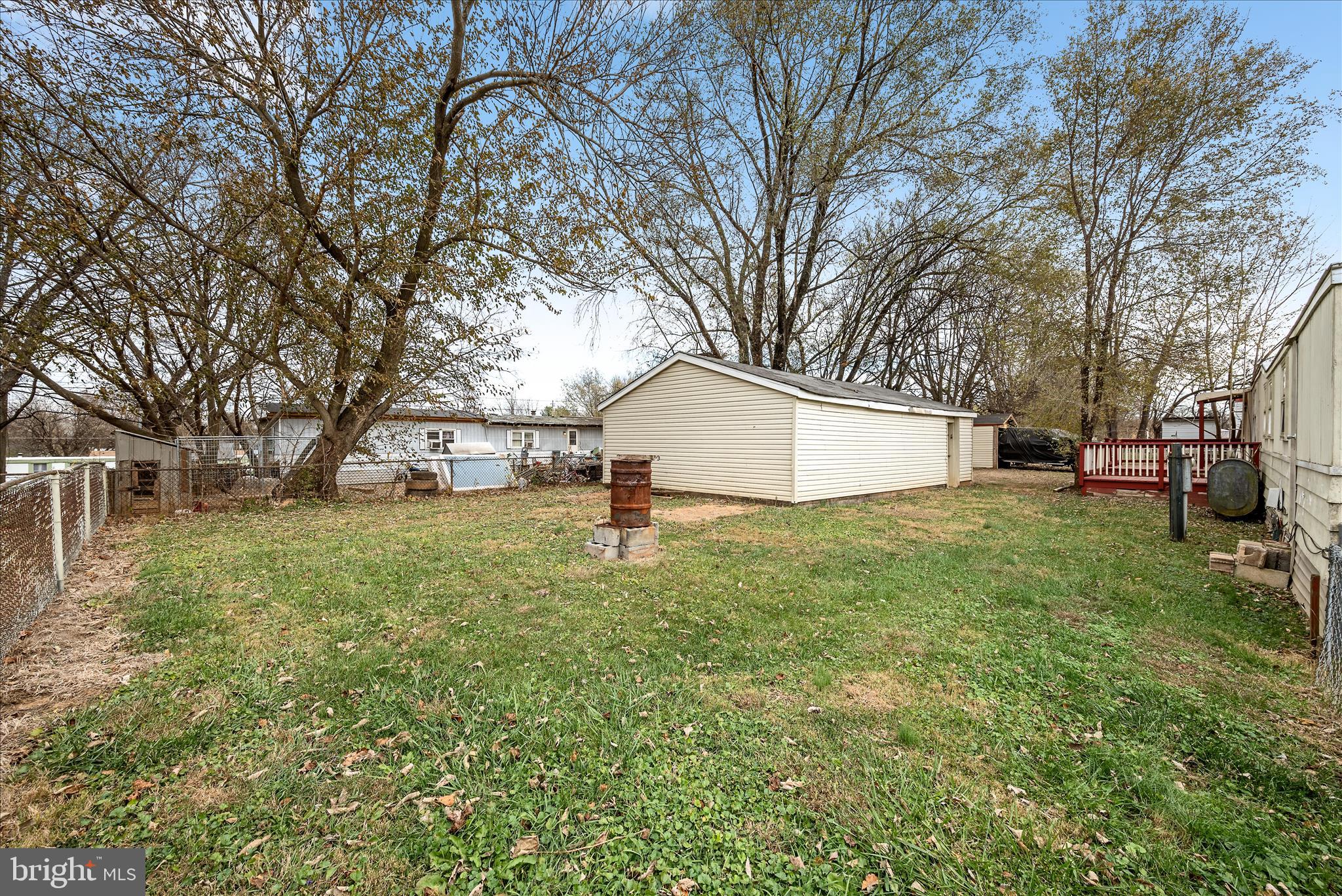 53 Anvil Road Kearneysville, WV 25430 - Photo 38 of 44 a view of a backyard with large trees