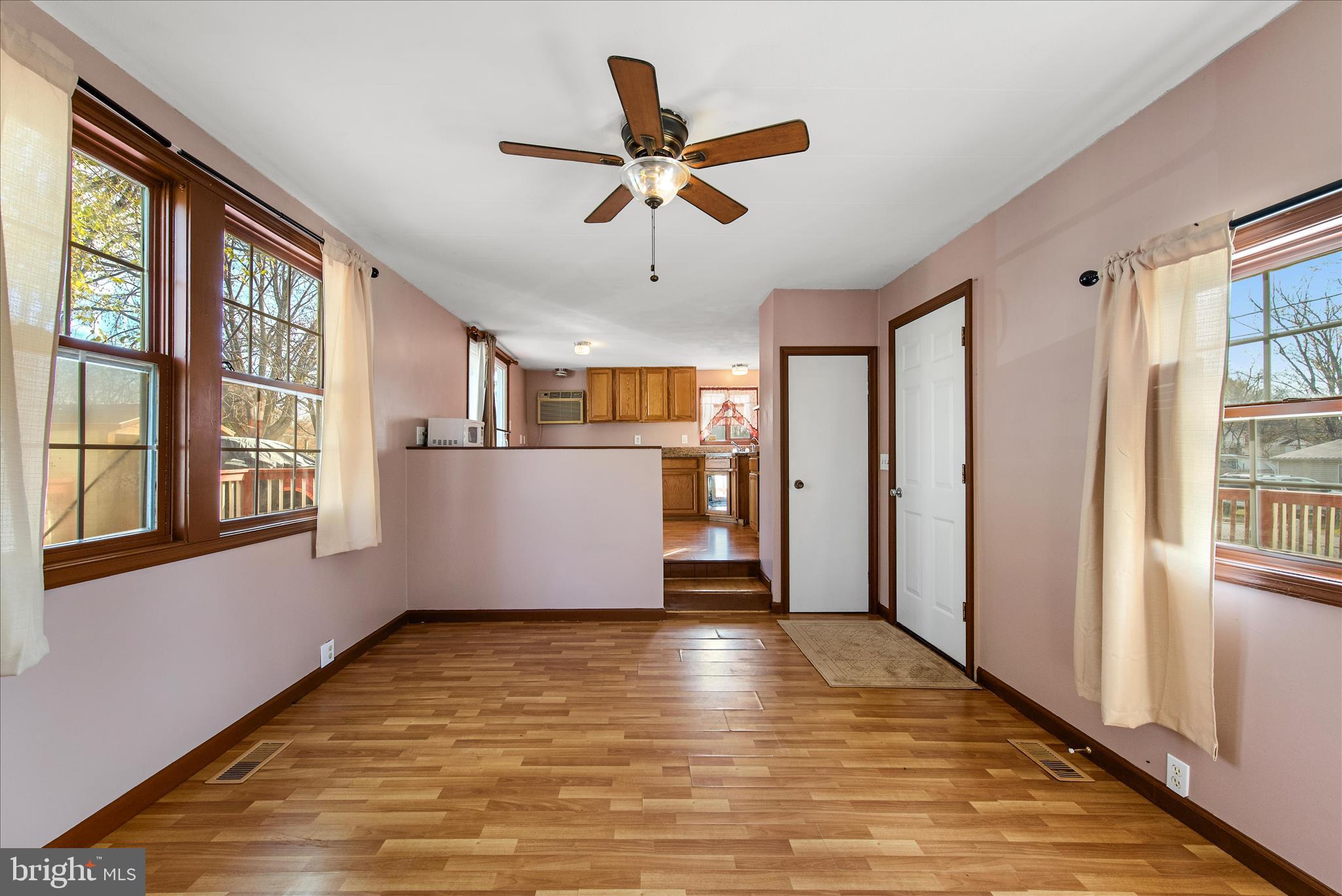53 Anvil Road Kearneysville, WV 25430 - Photo 4 of 44 a view of a livingroom with a ceiling fan and window