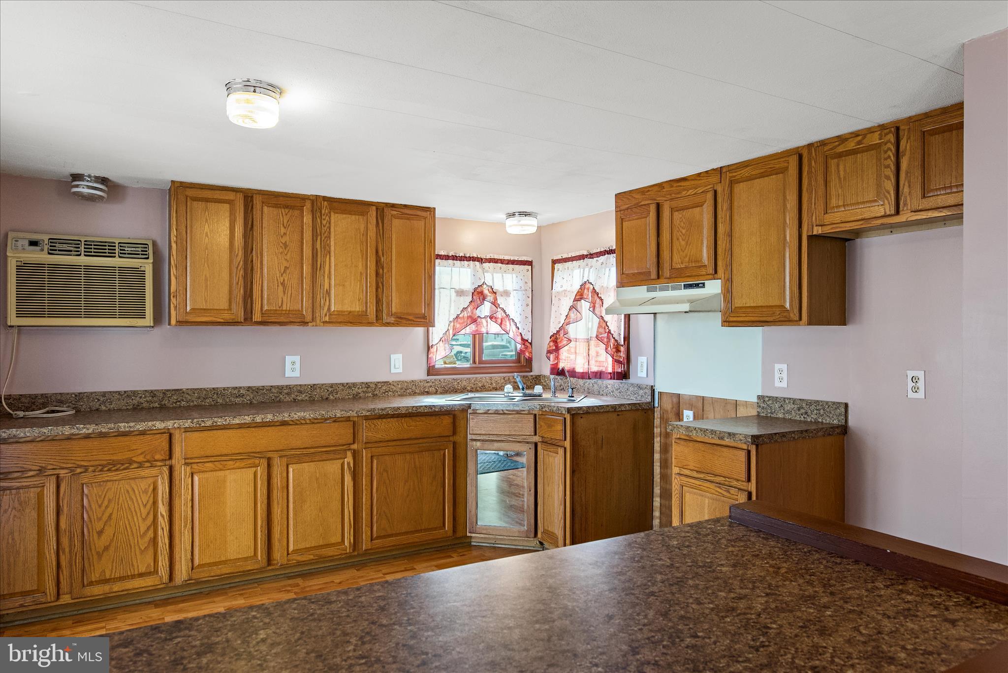 53 Anvil Road Kearneysville, WV 25430 - Photo 6 of 44 a kitchen with stainless steel appliances granite countertop a sink stove and cabinets