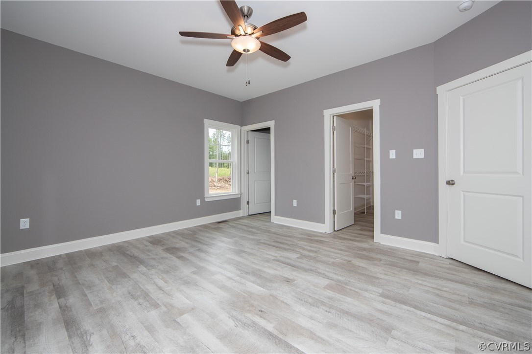 26 Perkins Road Cartersville, VA 23027 - Photo 11 of 22 The sophisticated primary bedroom has a spa-like f