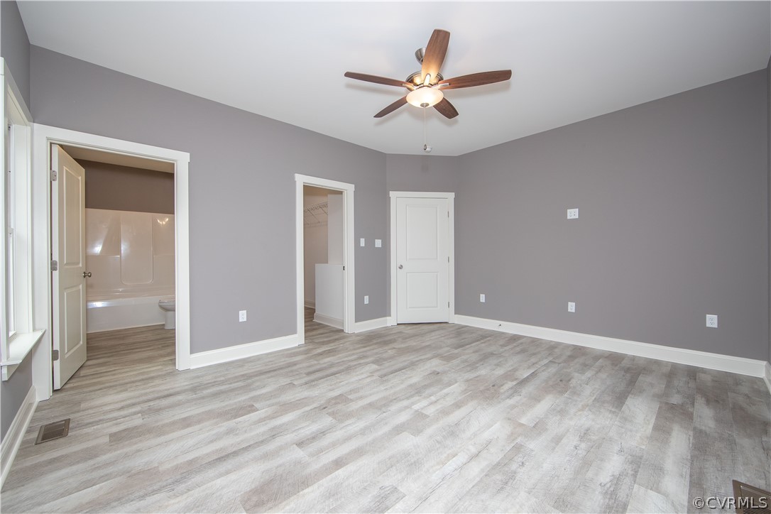 26 Perkins Road Cartersville, VA 23027 - Photo 12 of 22 The primary bedroom offers an ensuite bath, and a