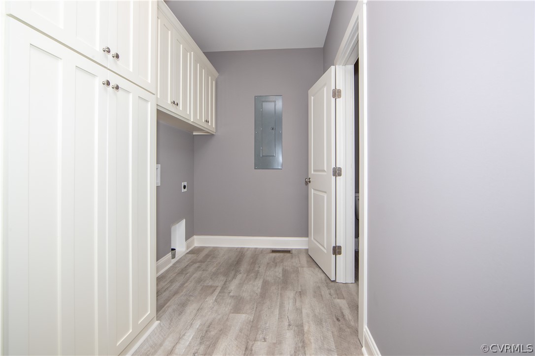 26 Perkins Road Cartersville, VA 23027 - Photo 18 of 22 The laundry room has built-in cabinets for storage