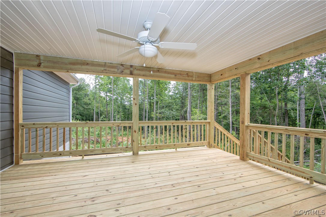 26 Perkins Road Cartersville, VA 23027 - Photo 19 of 22 Covered back deck has a ceiling fan.
