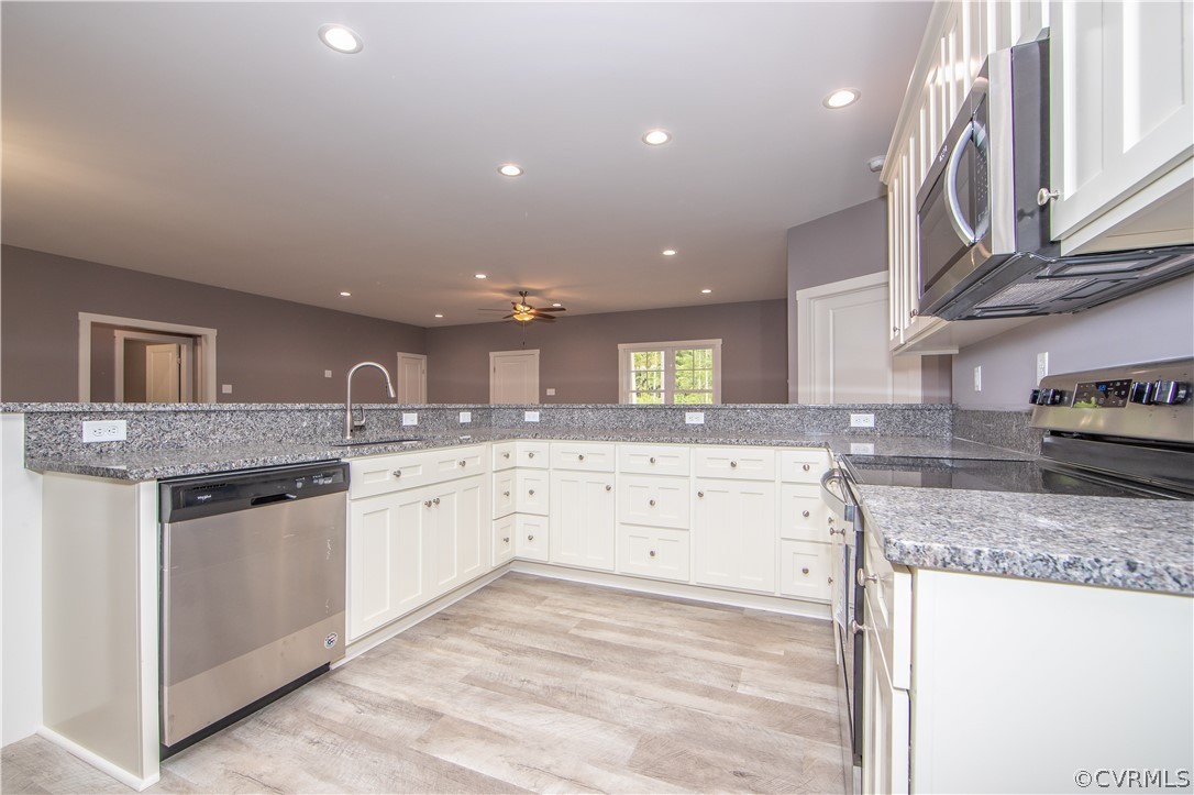 26 Perkins Road Cartersville, VA 23027 - Photo 3 of 22 The kitchen includes stainless steel appliances, g