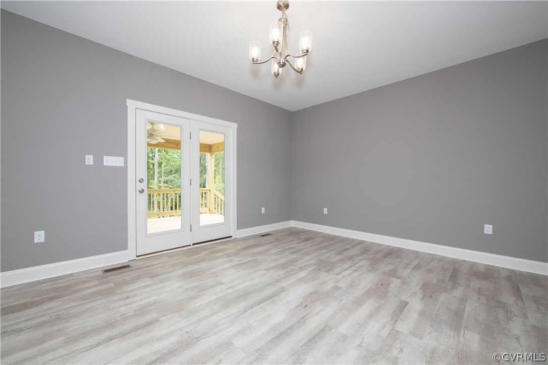 26 Perkins Road Cartersville, VA 23027 - Photo 7 of 22 The dining area has luxury vinyl plank flooring, d