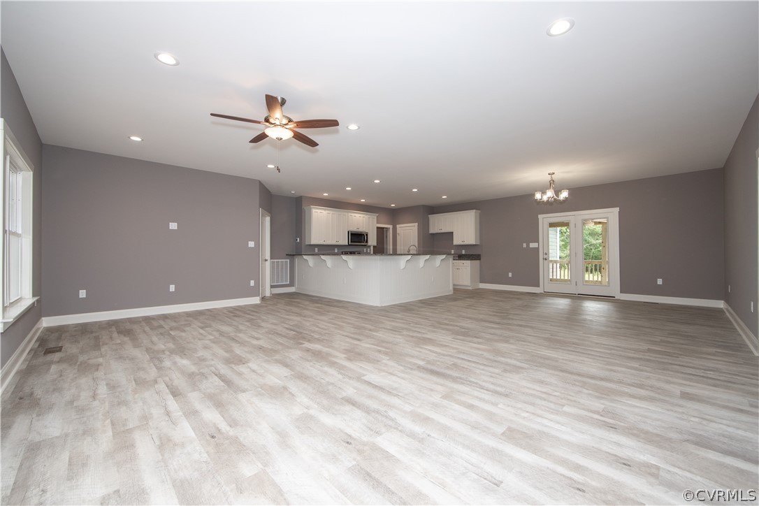 26 Perkins Road Cartersville, VA 23027 - Photo 9 of 22 Another view of the living room and the open conce