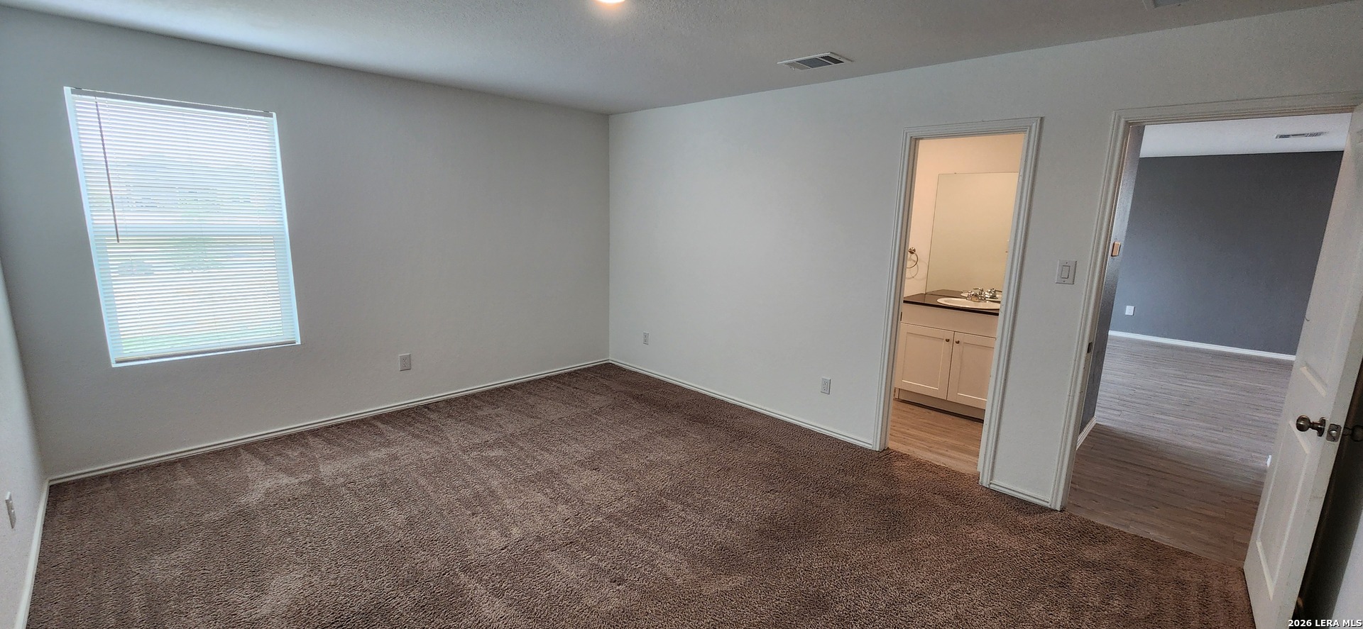 6013 Companion Loop Bulverde, TX 78163 - Photo 13 of 37 an empty room with windows