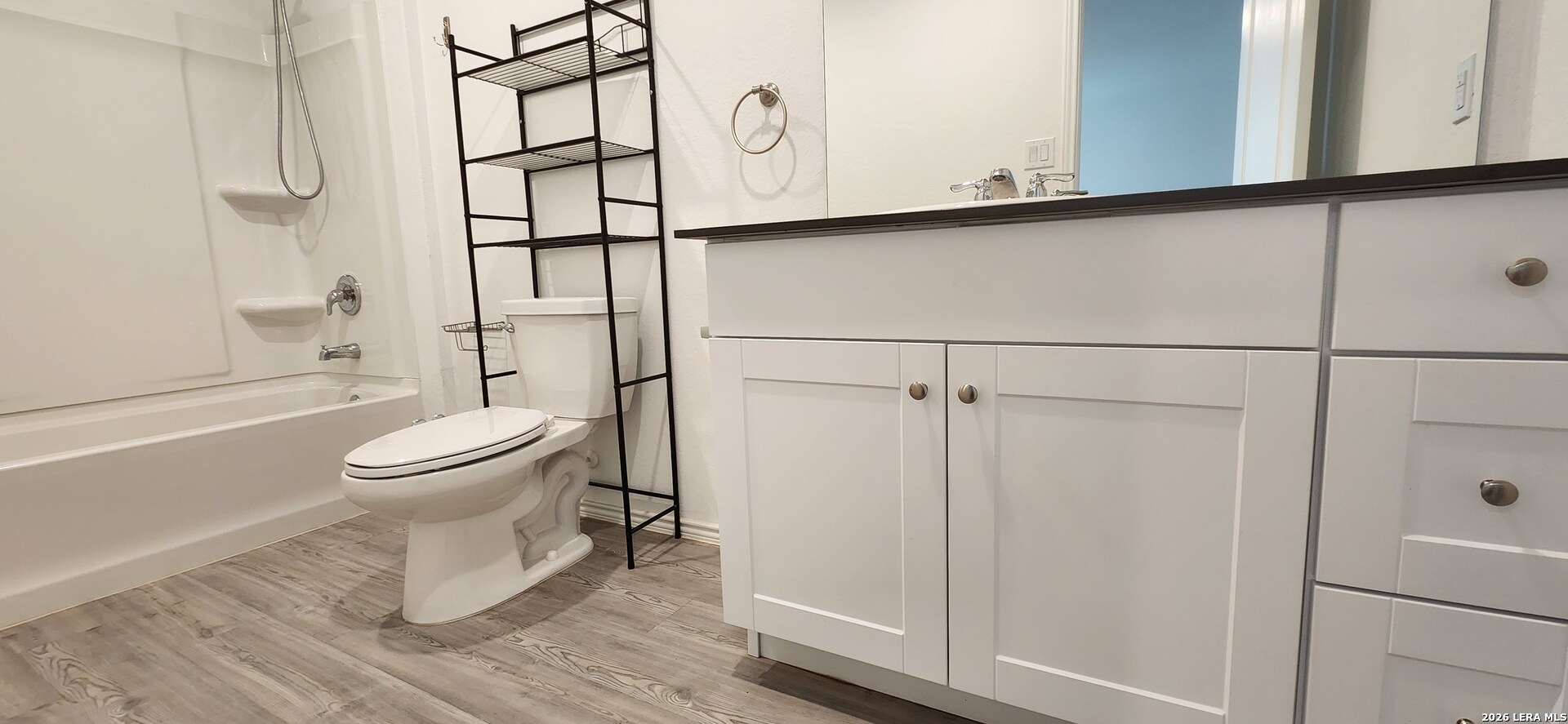 6013 Companion Loop Bulverde, TX 78163 - Photo 16 of 37 a bathroom with a toilet and a shower