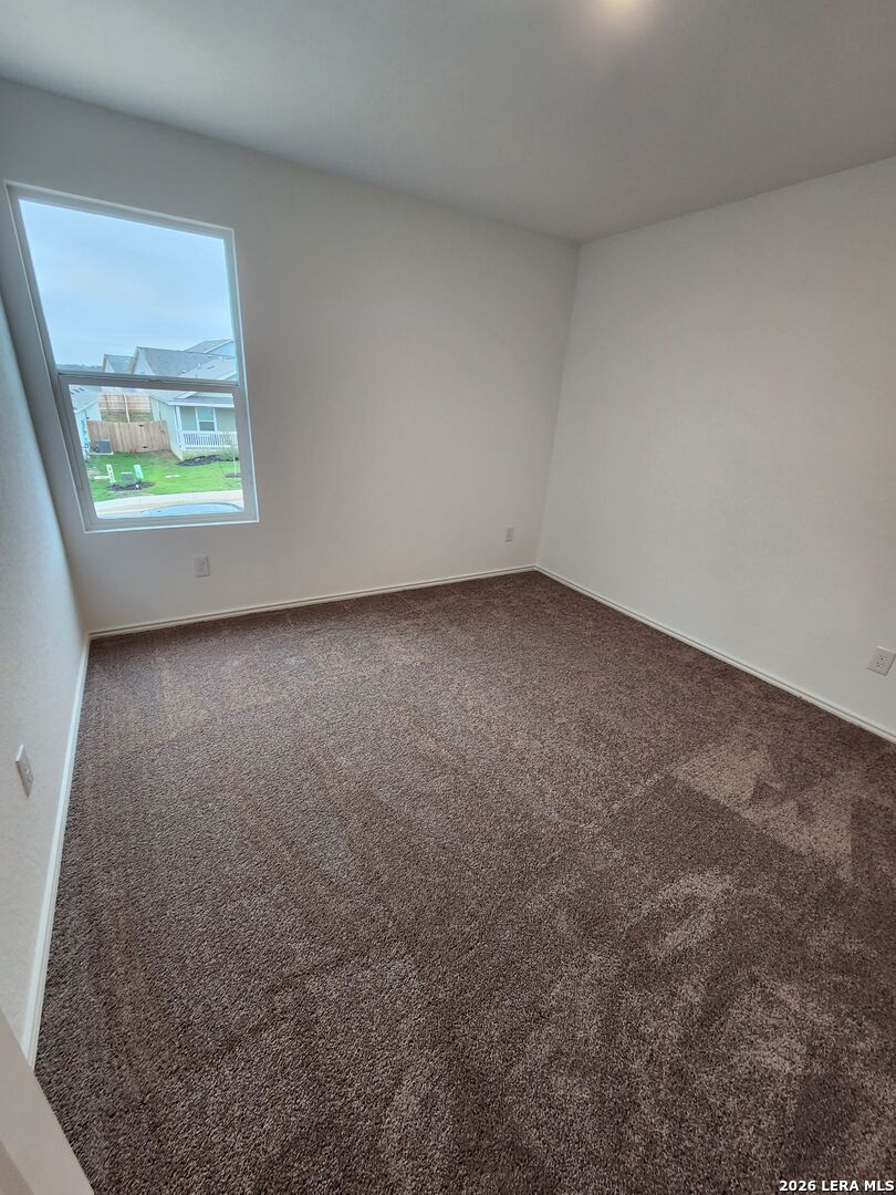 6013 Companion Loop Bulverde, TX 78163 - Photo 20 of 37 an empty room with windows