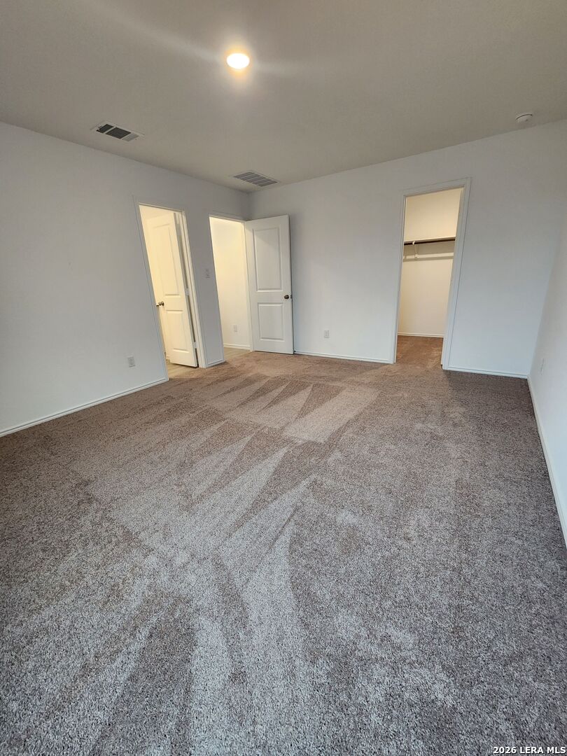6013 Companion Loop Bulverde, TX 78163 - Photo 28 of 37 a view of an empty room with a window