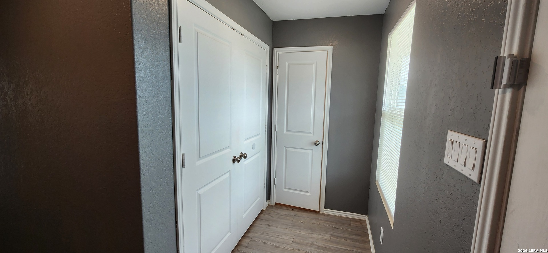 6013 Companion Loop Bulverde, TX 78163 - Photo 6 of 37 a view of a bathroom from the hallway