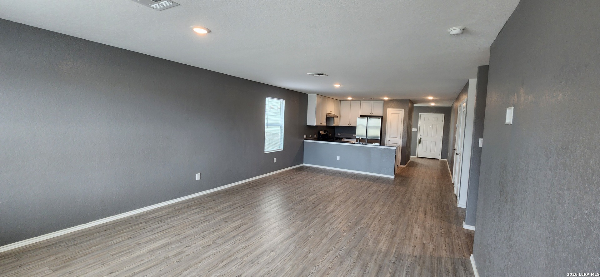 6013 Companion Loop Bulverde, TX 78163 - Photo 10 of 37 a view of kitchen with wooden floor