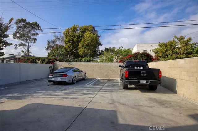 a car parked in the back of a building