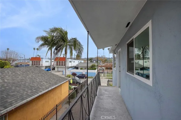 a view of a backyard of a house