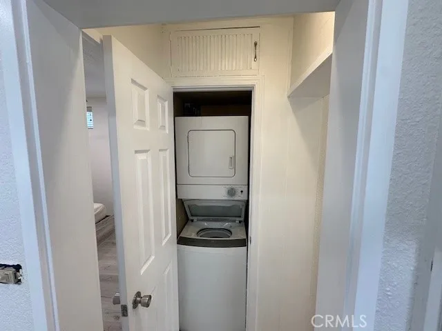 a bathroom with a walk in closet