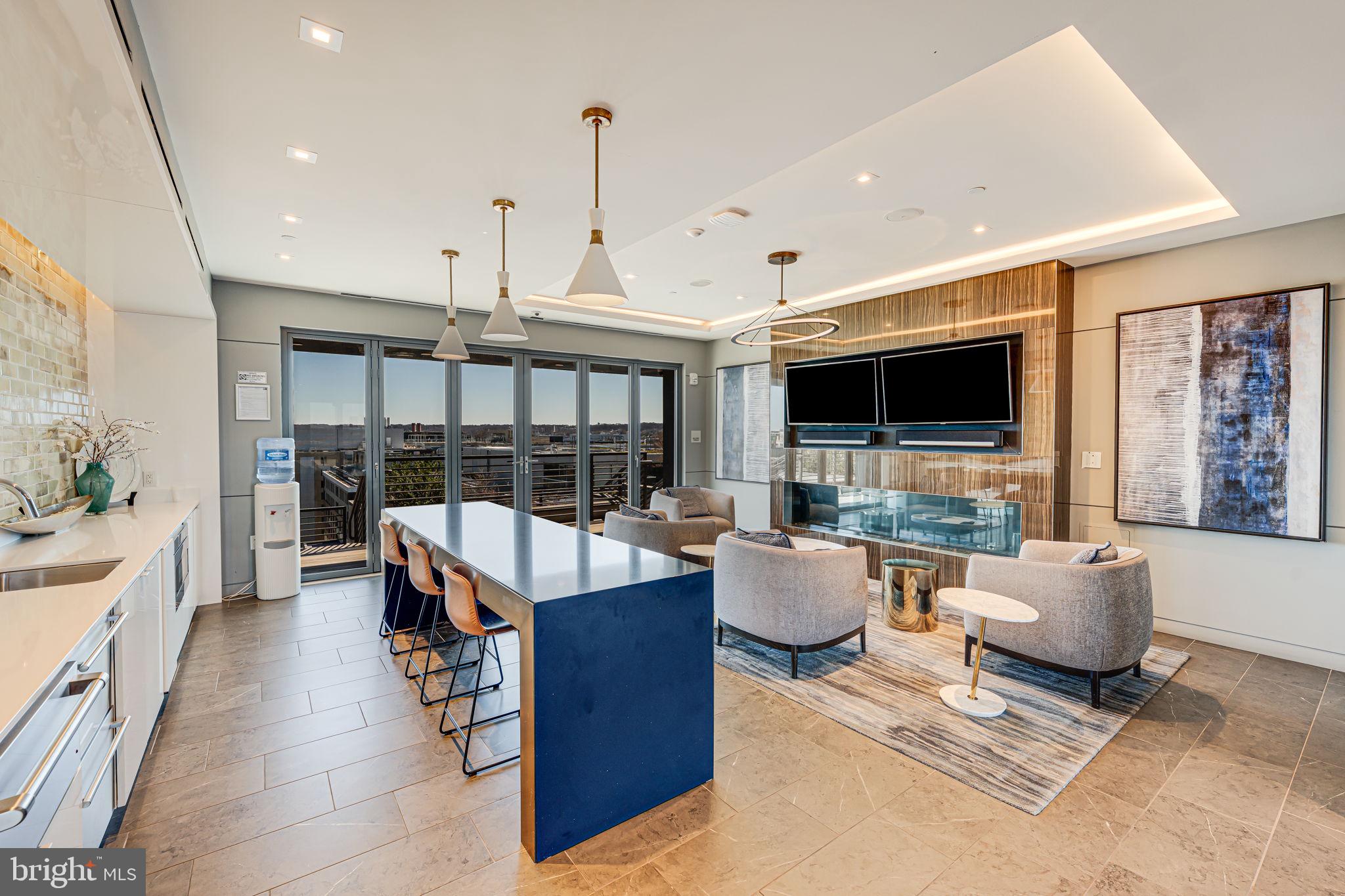1211 Van Street Southeast, Unit 309 Washington, DC 20003 - Photo 37 of 66 a living room with fireplace furniture and a flat screen tv
