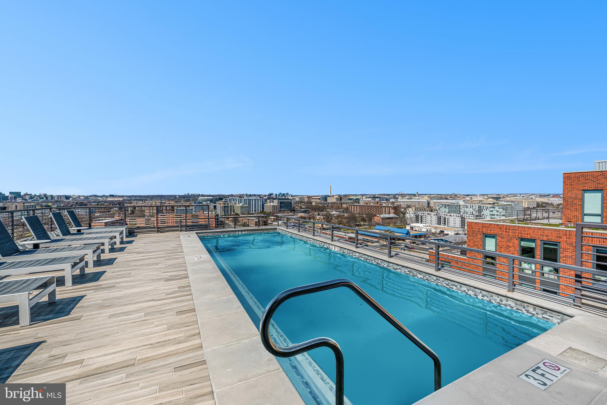 1211 Van Street Southeast, Unit 309 Washington, DC 20003 - Photo 39 of 66 a view of a balcony with seating space