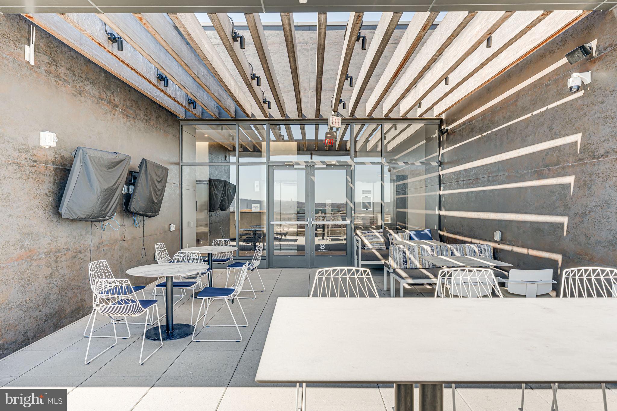 1211 Van Street Southeast, Unit 309 Washington, DC 20003 - Photo 42 of 66 a living room with furniture