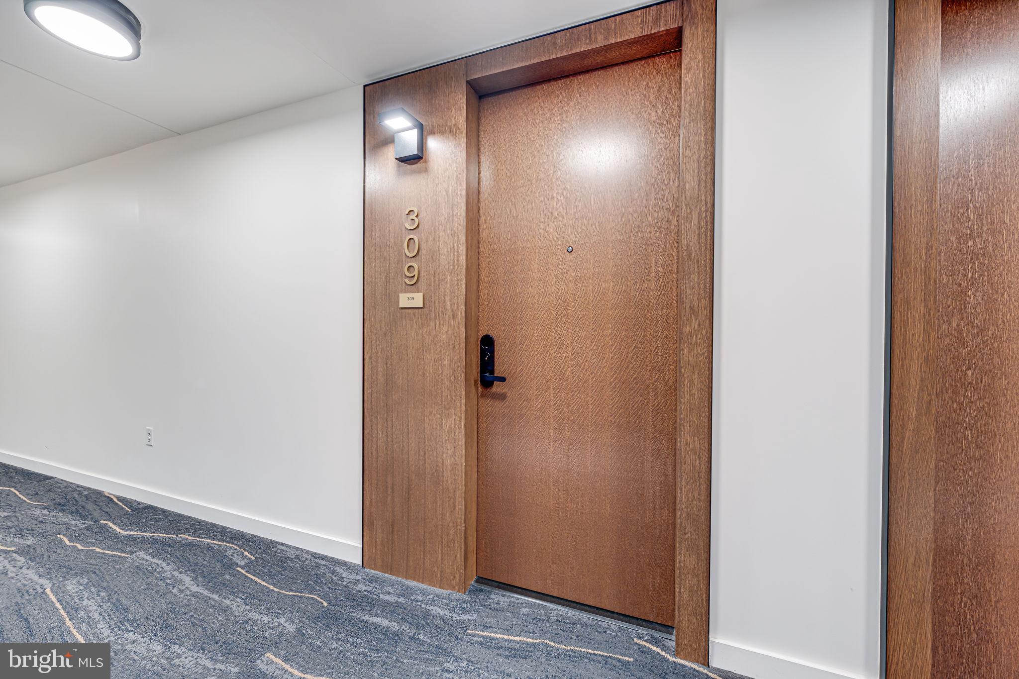 1211 Van Street Southeast, Unit 309 Washington, DC 20003 - Photo 9 of 66 a view of a bathroom with mirror