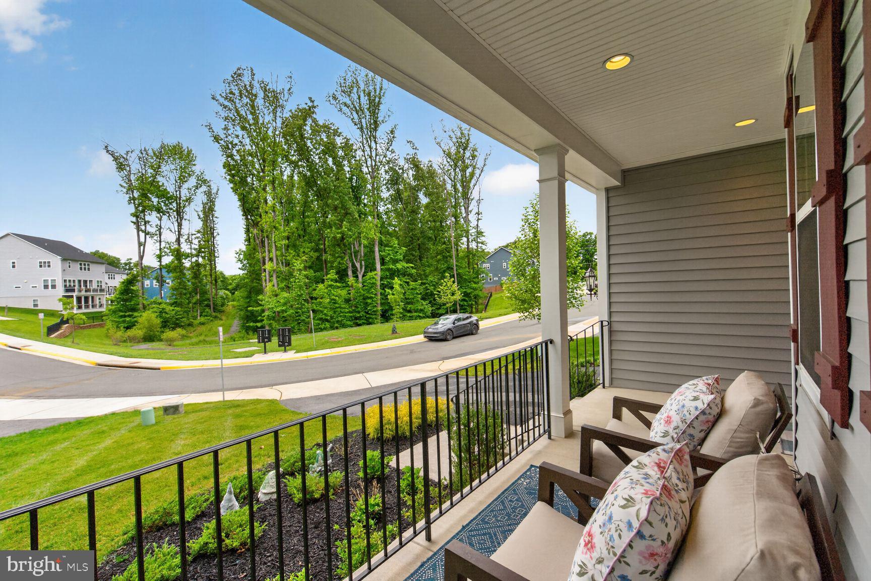 6213 Mcconnell Lane Springfield, VA 22152 - Photo 3 of 39 a view of a balcony with chairs