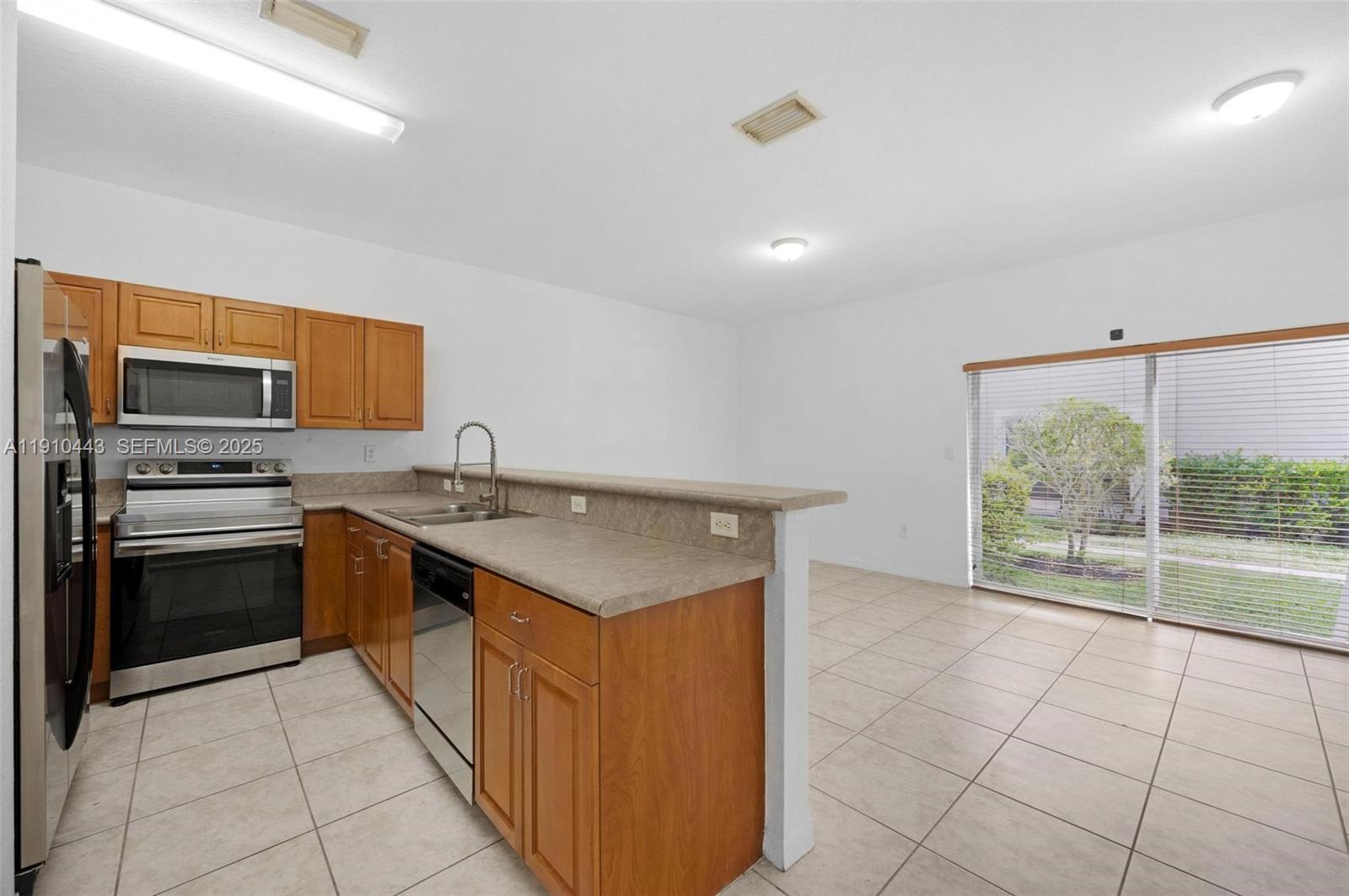 14046 Southwest 49th Street, Unit 16 Miramar, FL 33027 - Photo 6 of 37
