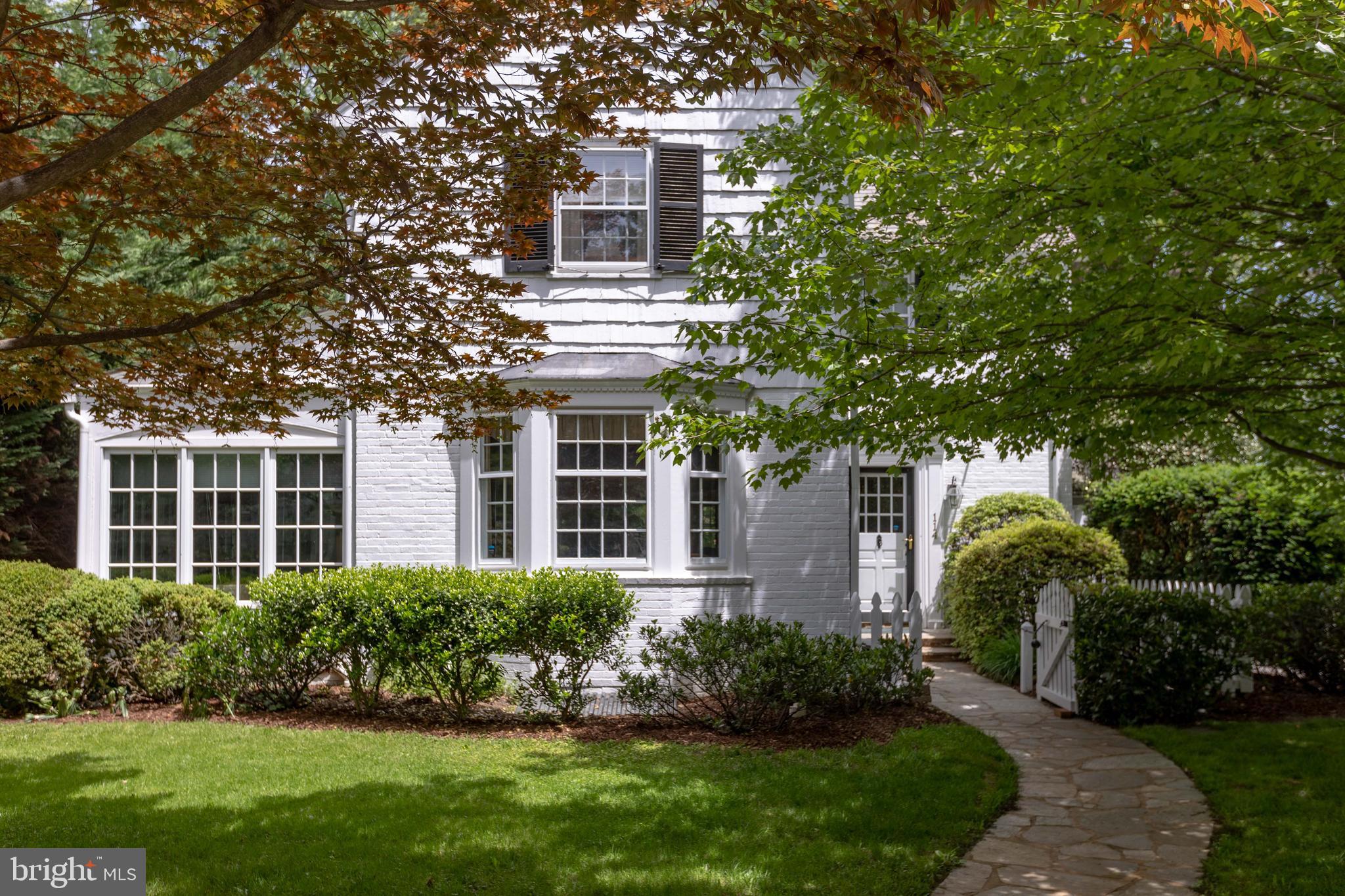 114 Bellemore Road Baltimore, MD 21210 - Photo 1 of 49 a front view of a house with a garden
