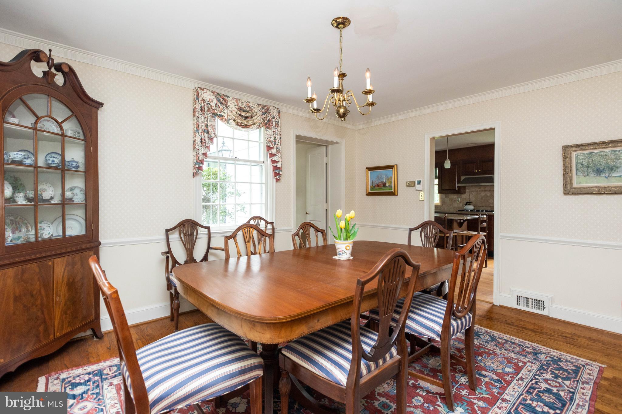 114 Bellemore Road Baltimore, MD 21210 - Photo 12 of 49 a view of a dining room with furniture window and wooden floor