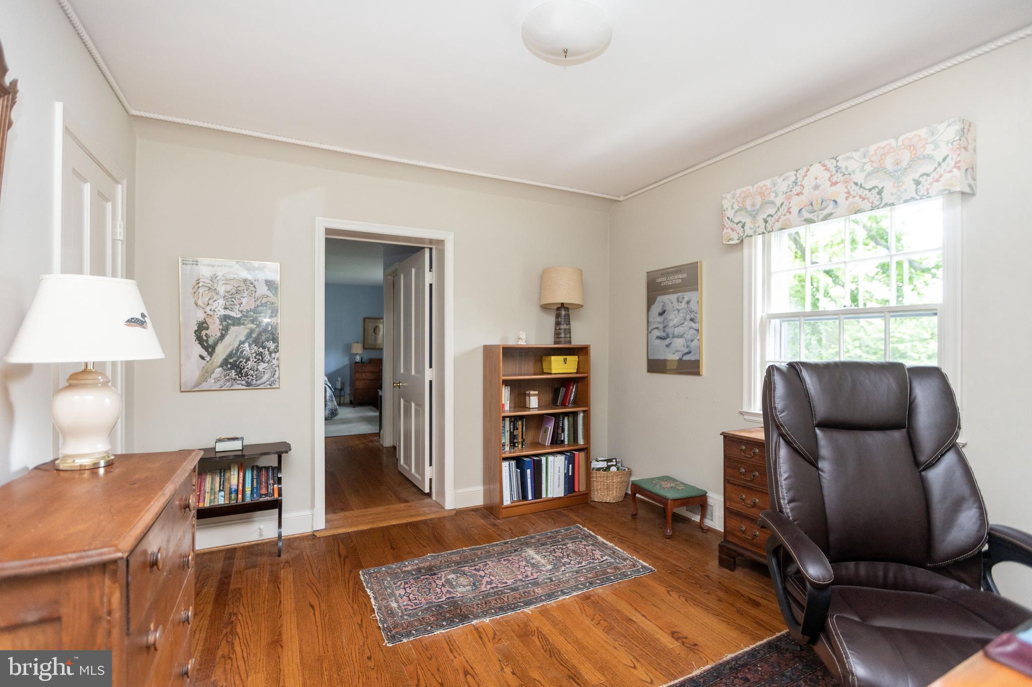 114 Bellemore Road Baltimore, MD 21210 - Photo 29 of 49 a living room with furniture and a book shelf
