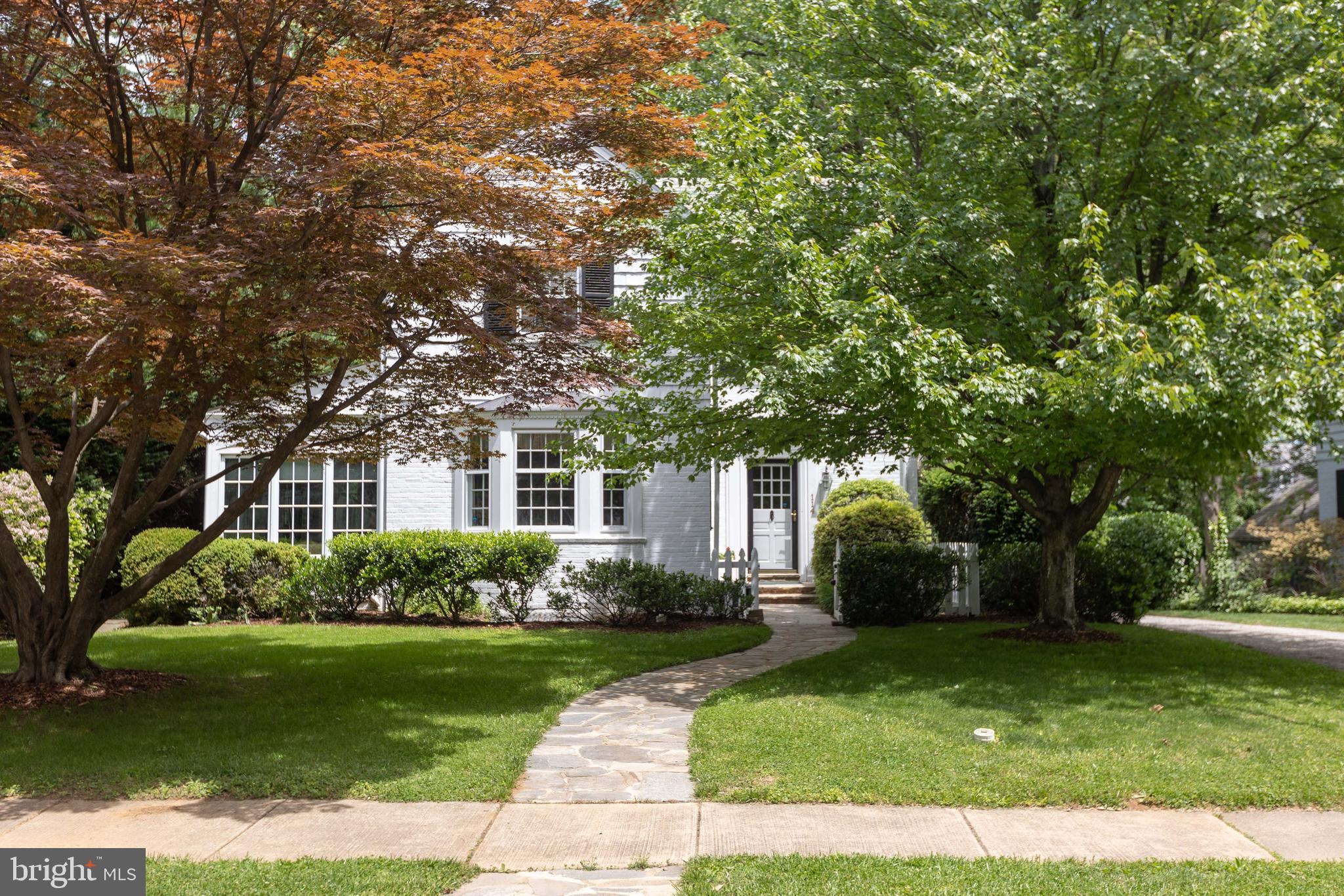 114 Bellemore Road Baltimore, MD 21210 - Photo 4 of 49 a front view of a house with a garden