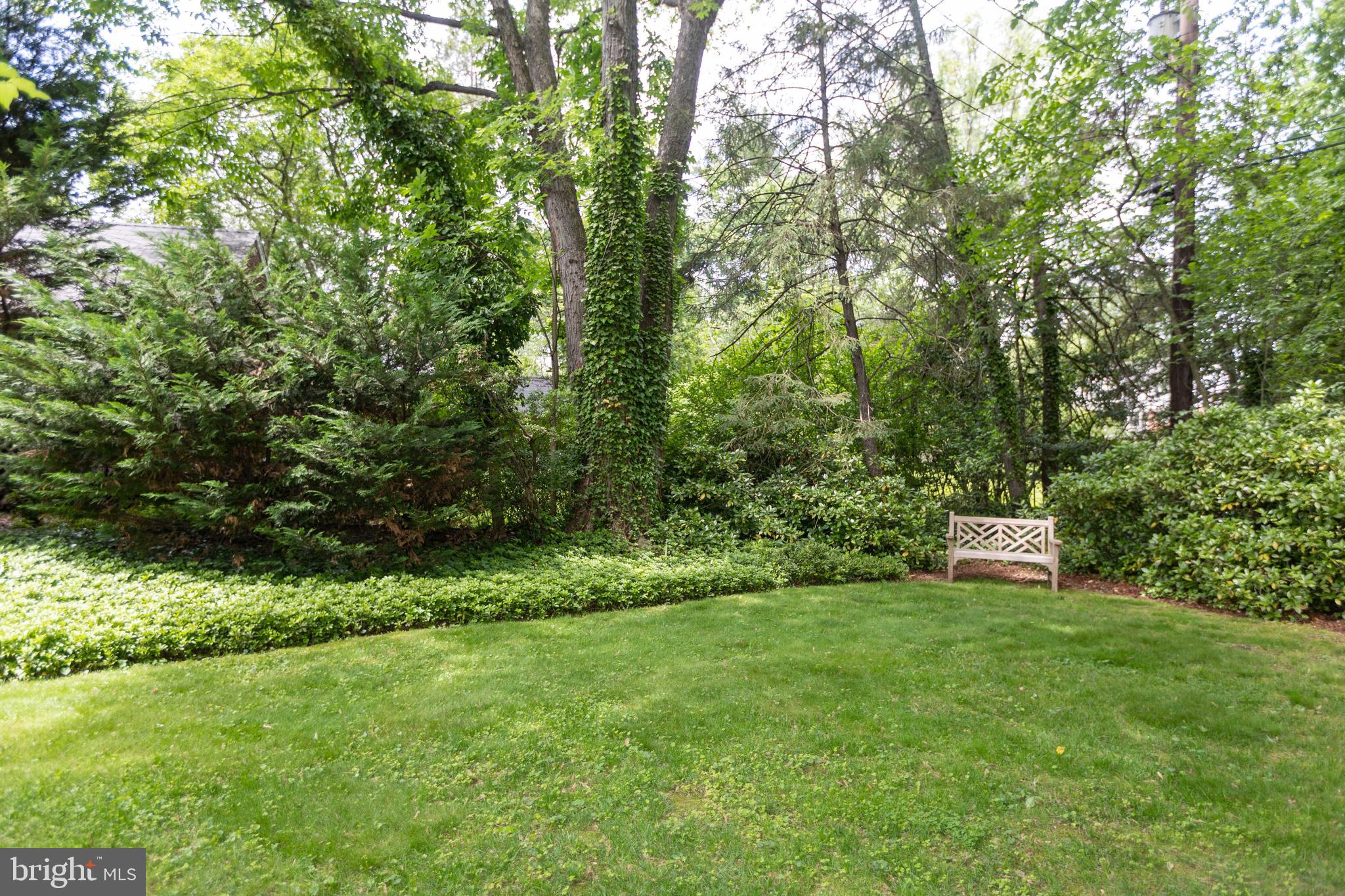 114 Bellemore Road Baltimore, MD 21210 - Photo 46 of 49 a view of a park with a bench