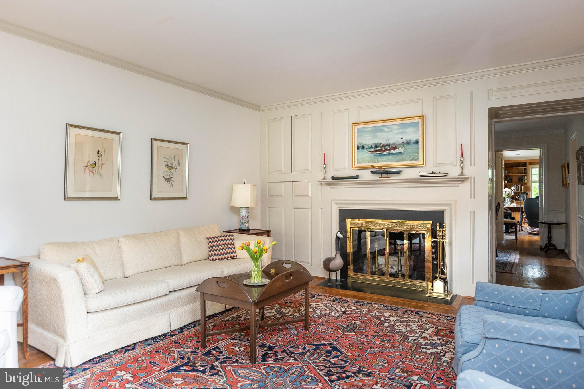 114 Bellemore Road Baltimore, MD 21210 - Photo 7 of 49 a living room with furniture and a fireplace
