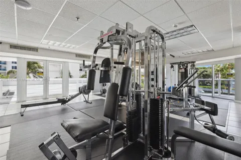 a view of a swimming pool and lounge chairs