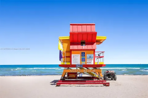 a dining room with furniture a rug and a chandelier