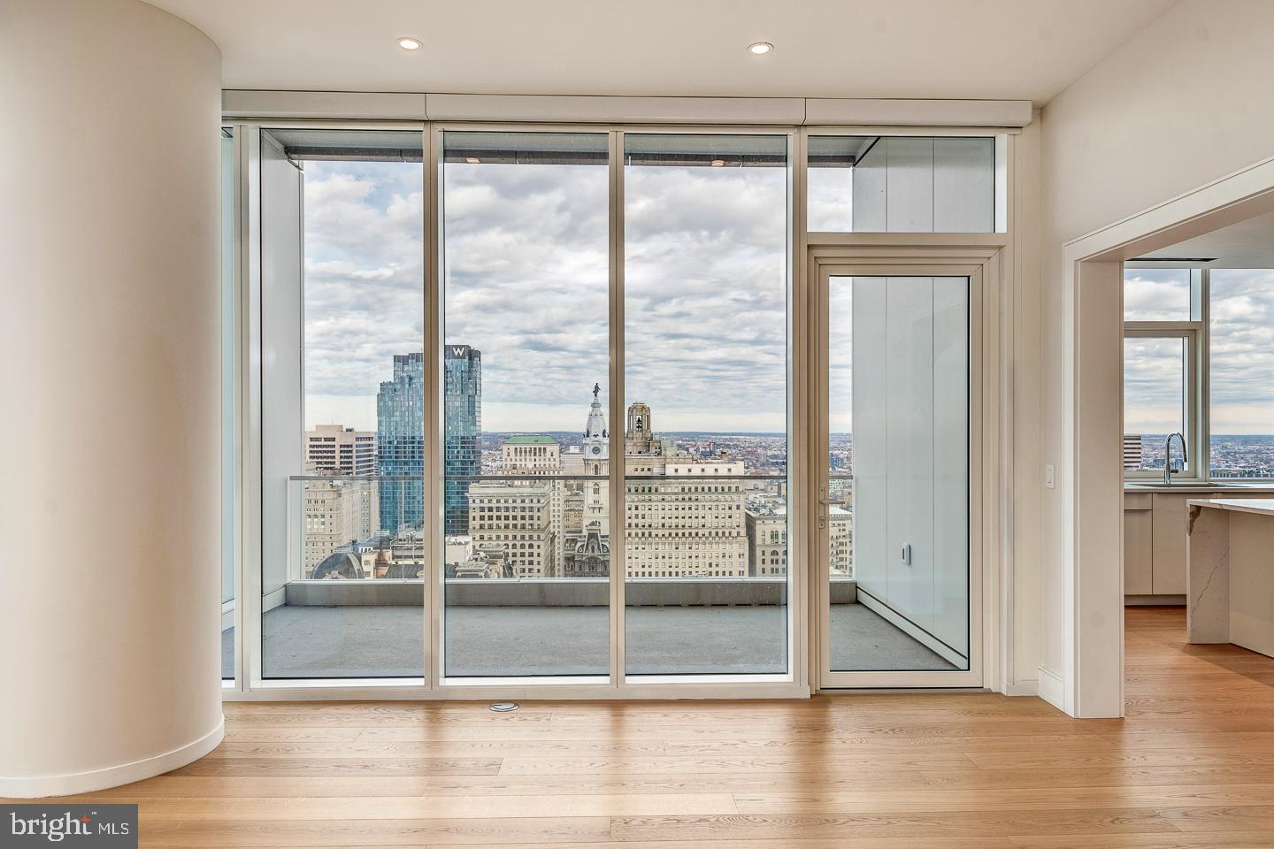 301 South Broad Street, Unit 4001 Philadelphia, PA 19107 - Photo 14 of 84 a view of a room with wooden floor and windows