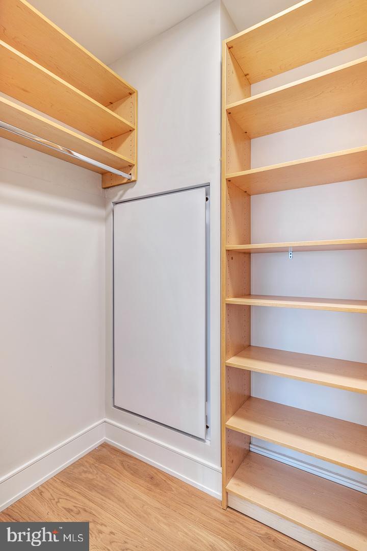 301 South Broad Street, Unit 4001 Philadelphia, PA 19107 - Photo 16 of 84 a view of walk in closet with empty racks