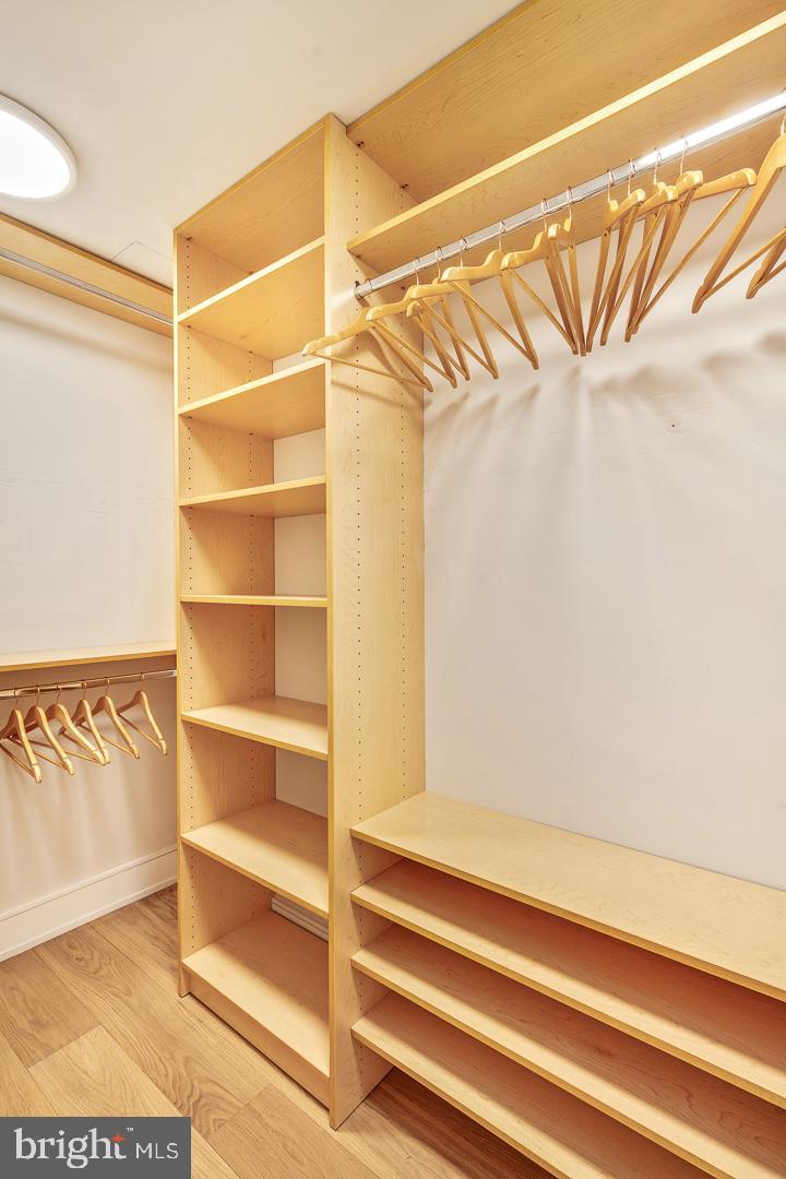 301 South Broad Street, Unit 4001 Philadelphia, PA 19107 - Photo 40 of 84 a view of walk in closet with empty racks