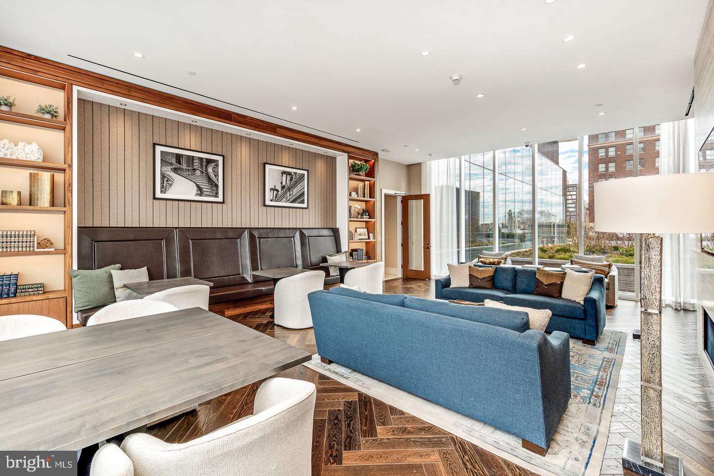 301 South Broad Street, Unit 4001 Philadelphia, PA 19107 - Photo 50 of 84 a living room with furniture and large windows