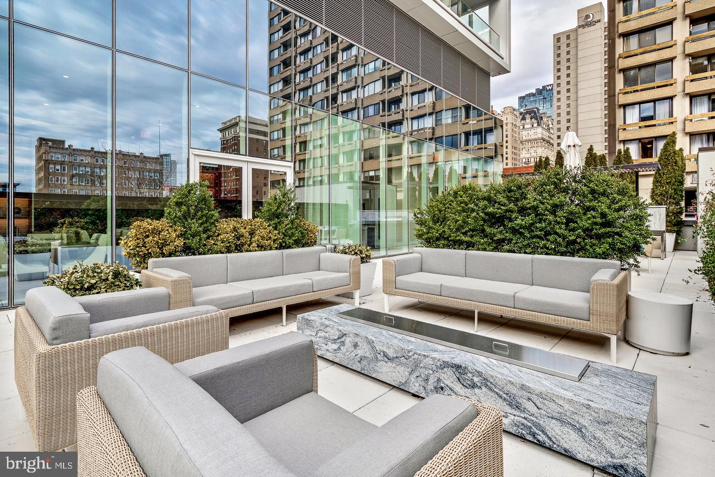 301 South Broad Street, Unit 4001 Philadelphia, PA 19107 - Photo 62 of 84 a view of a patio with couches and a potted plant