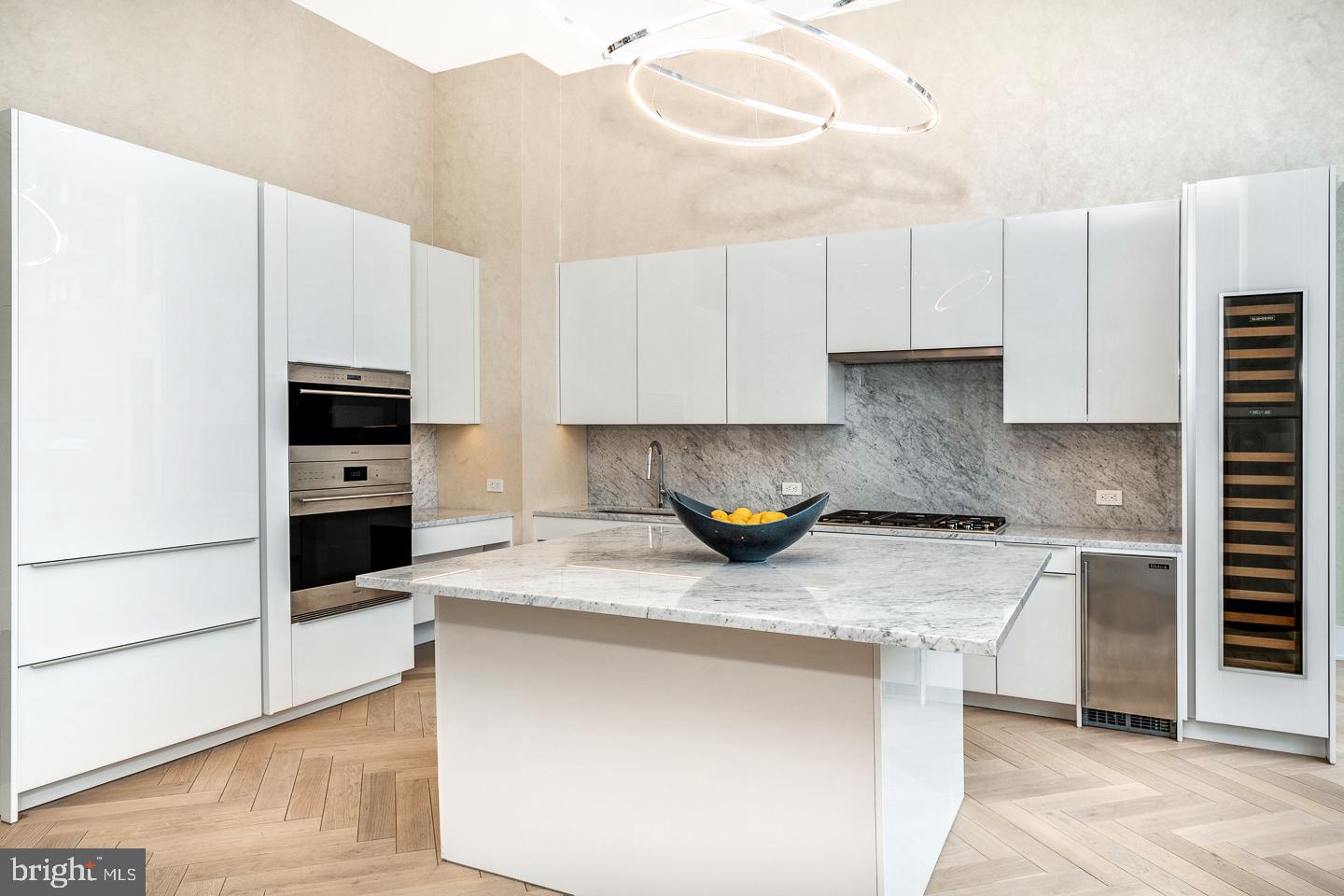 301 South Broad Street, Unit 4001 Philadelphia, PA 19107 - Photo 75 of 84 a kitchen with stainless steel appliances granite countertop a sink stove and refrigerator