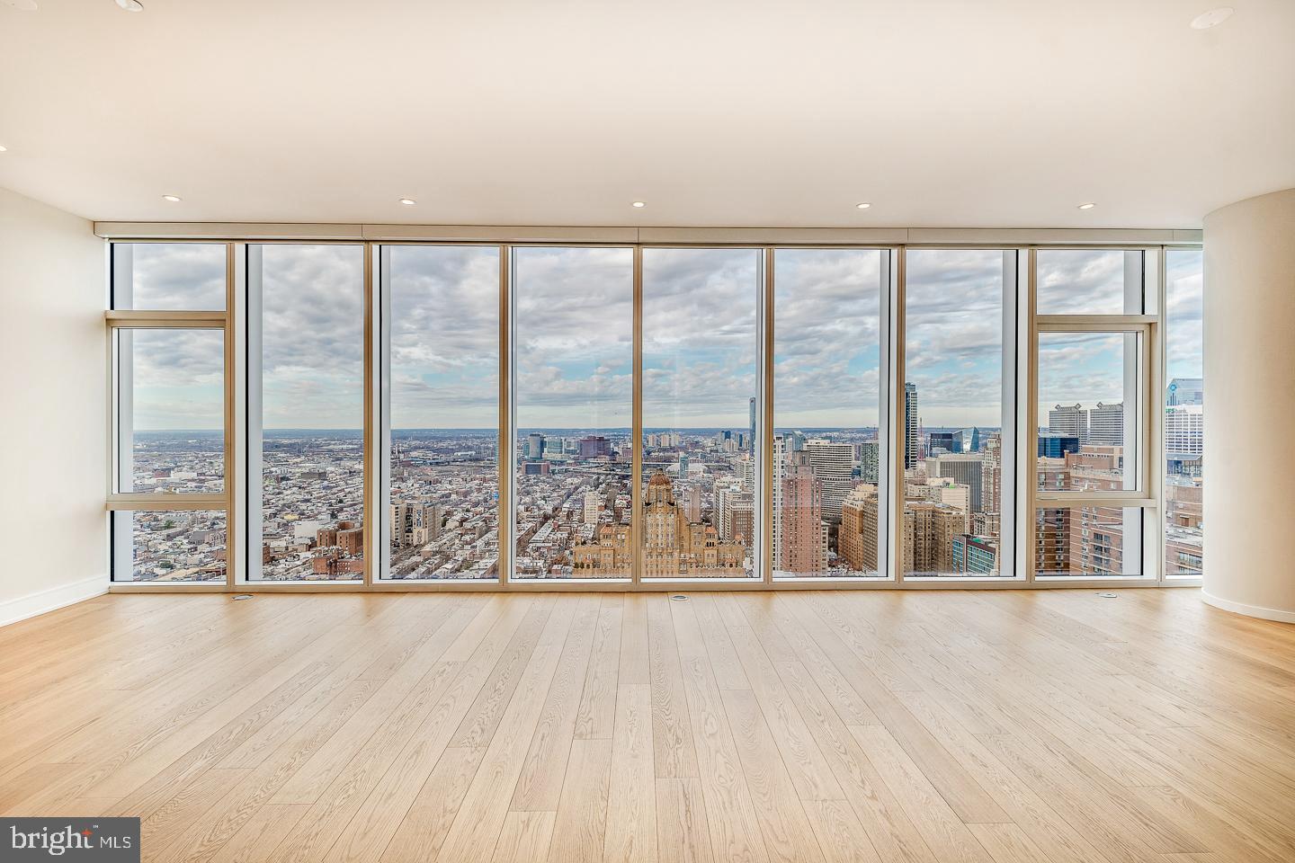 301 South Broad Street, Unit 4001 Philadelphia, PA 19107 - Photo 9 of 84 a view of an empty room and wooden floor