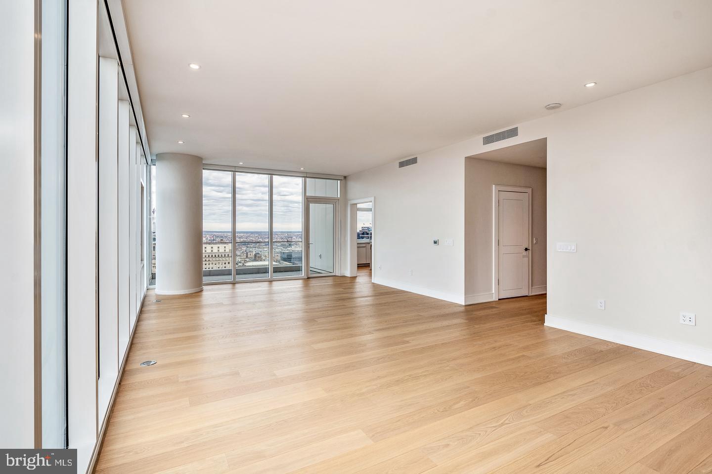 301 South Broad Street, Unit 4001 Philadelphia, PA 19107 - Photo 10 of 84 wooden floor in an empty room with a window