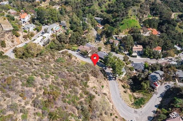 a aerial view of mountain and red space