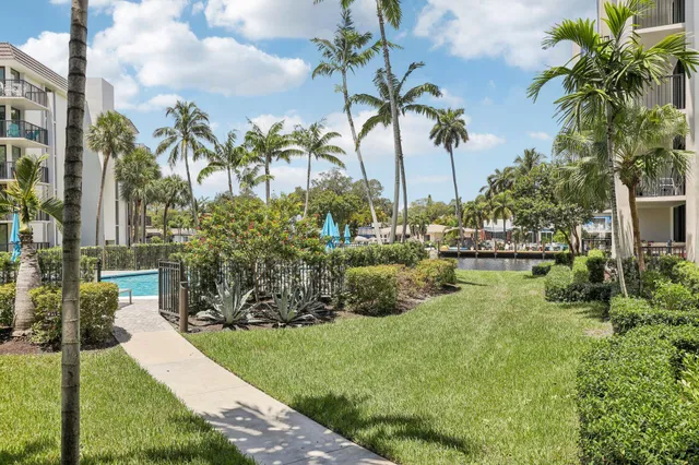 a view of a swimming pool with a garden