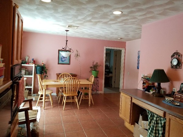 91 Meadow Road Townsend, MA 01469 - Photo 5 of 9 a dining room with furniture and wooden floor