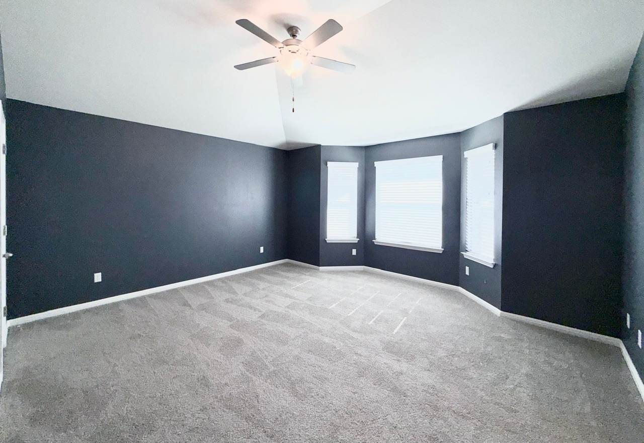 1005 Sundrops Street Leander, TX 78641 - Photo 15 of 39 a view of an empty room with a window