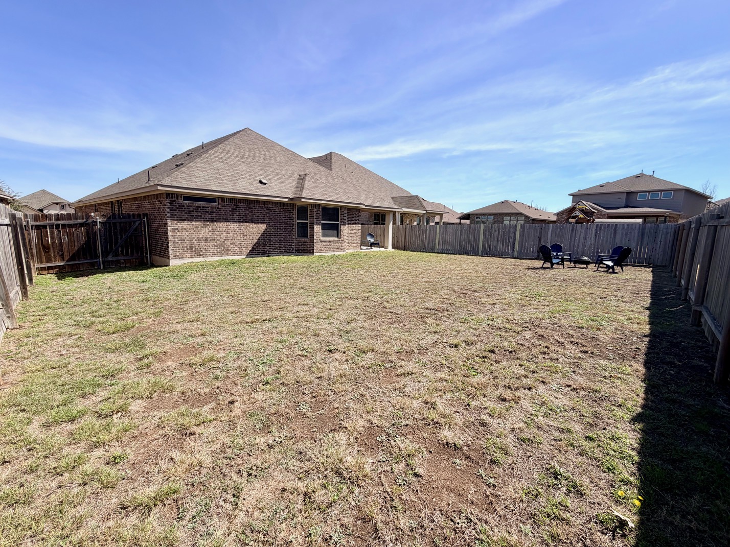 1005 Sundrops Street Leander, TX 78641 - Photo 27 of 39 a front view of a house with a yard