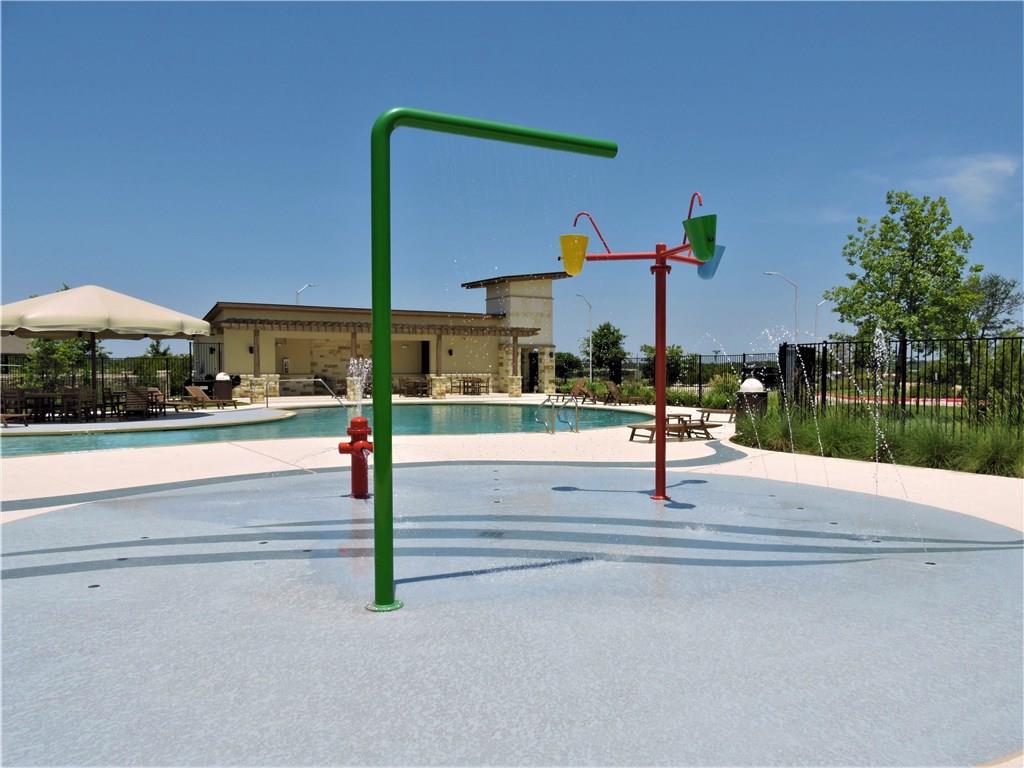 1005 Sundrops Street Leander, TX 78641 - Photo 32 of 39 a view of street with an apartment building