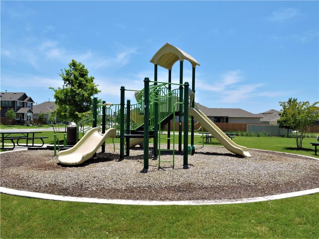 1005 Sundrops Street Leander, TX 78641 - Photo 35 of 39 a view of a park with slide