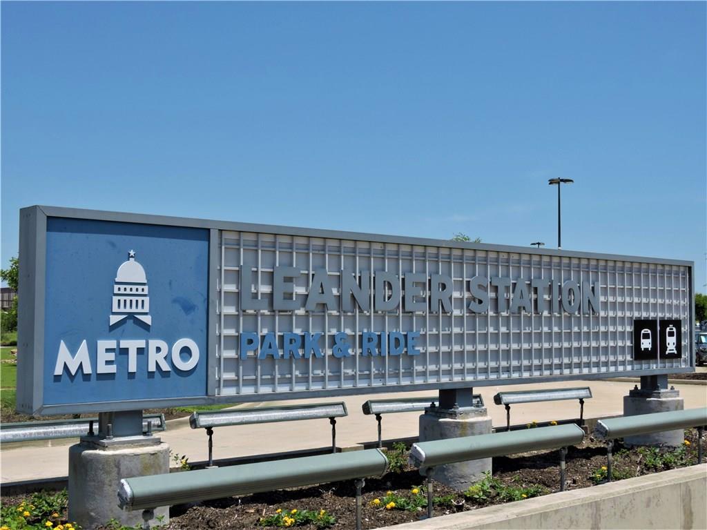 1005 Sundrops Street Leander, TX 78641 - Photo 36 of 39 a table with chairs and painting on it