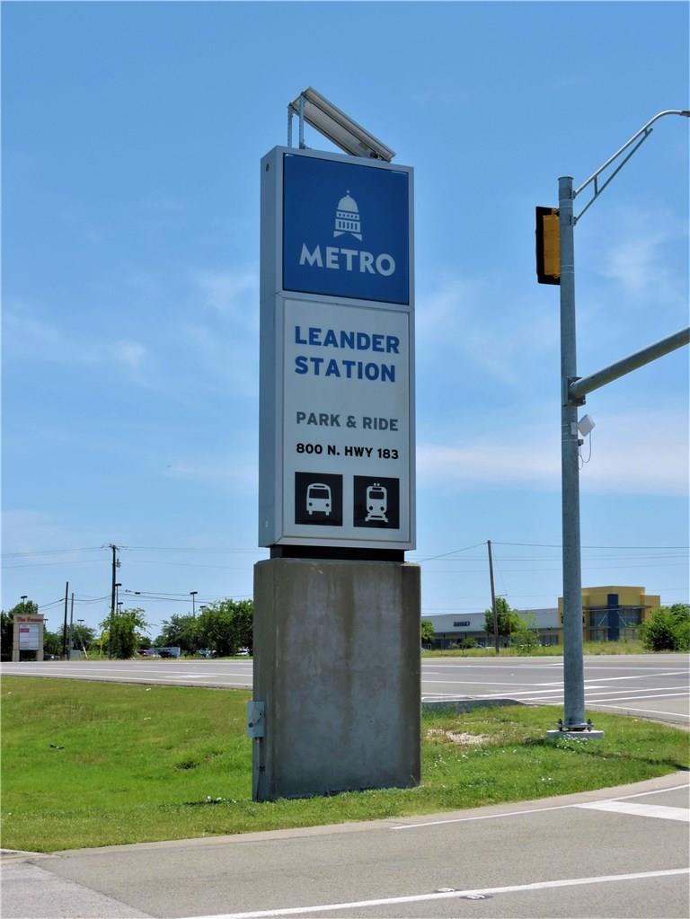 1005 Sundrops Street Leander, TX 78641 - Photo 37 of 39 a view of a street with a building in the background